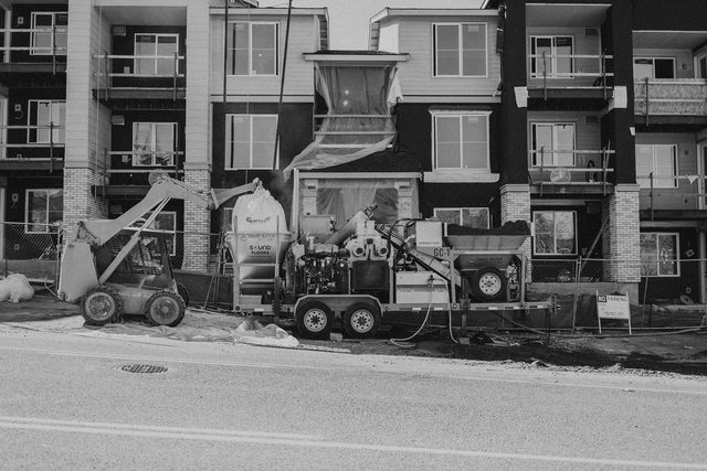 The GC-1 rig and jobsite scene in documentary black and white